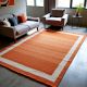 Hand Knotted Orange And Beige Wool Rug